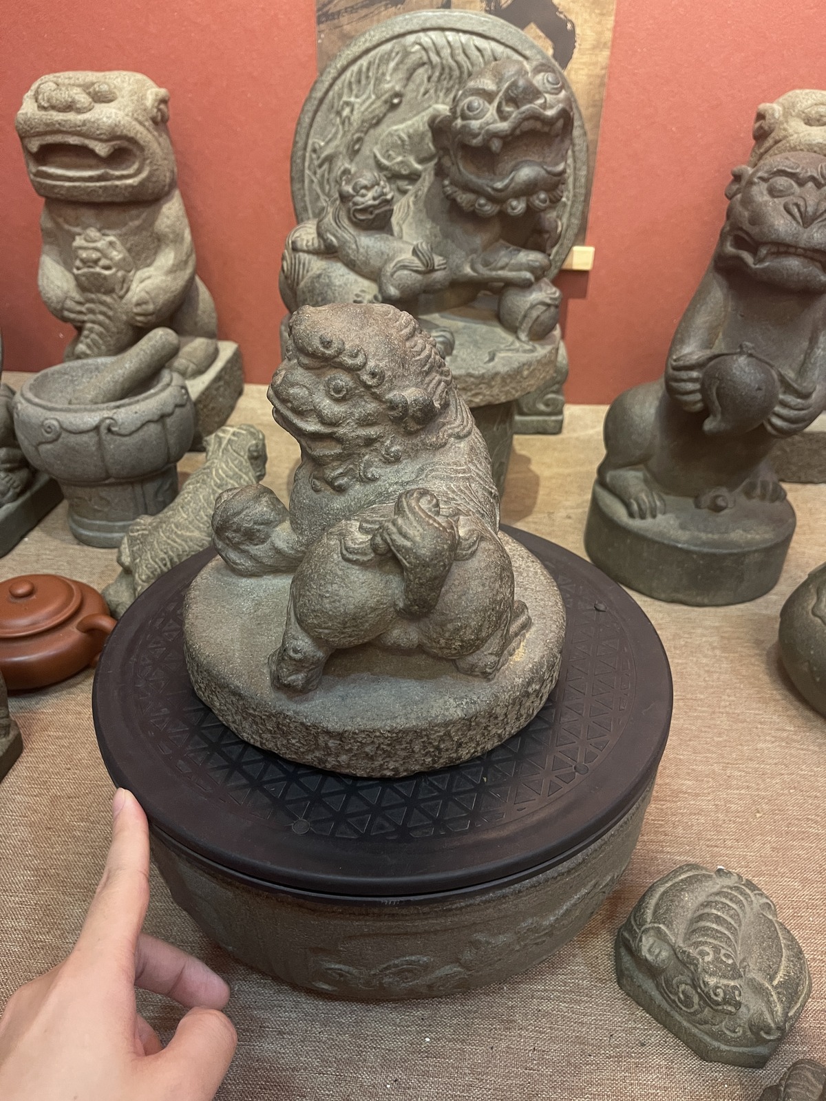 Carved Stone Guardian Lion with Ball on Round Base