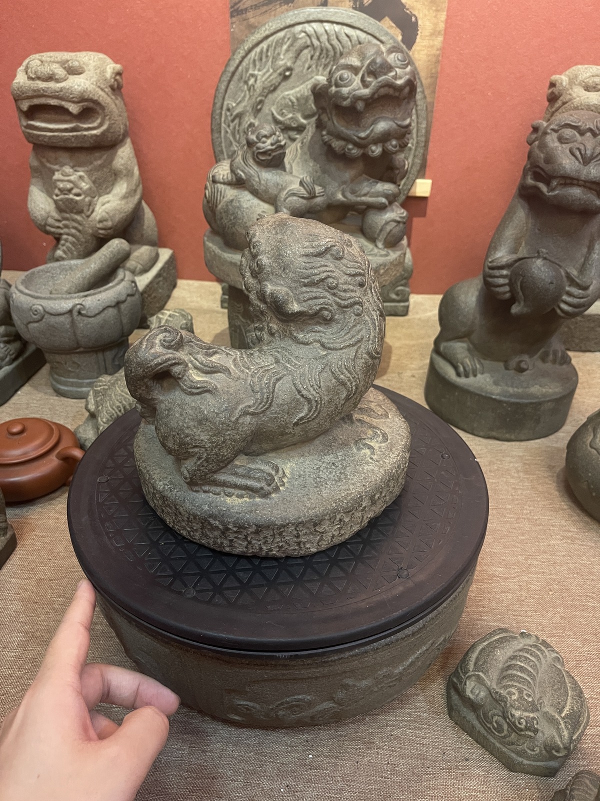 Carved Stone Guardian Lion with Ball on Round Base