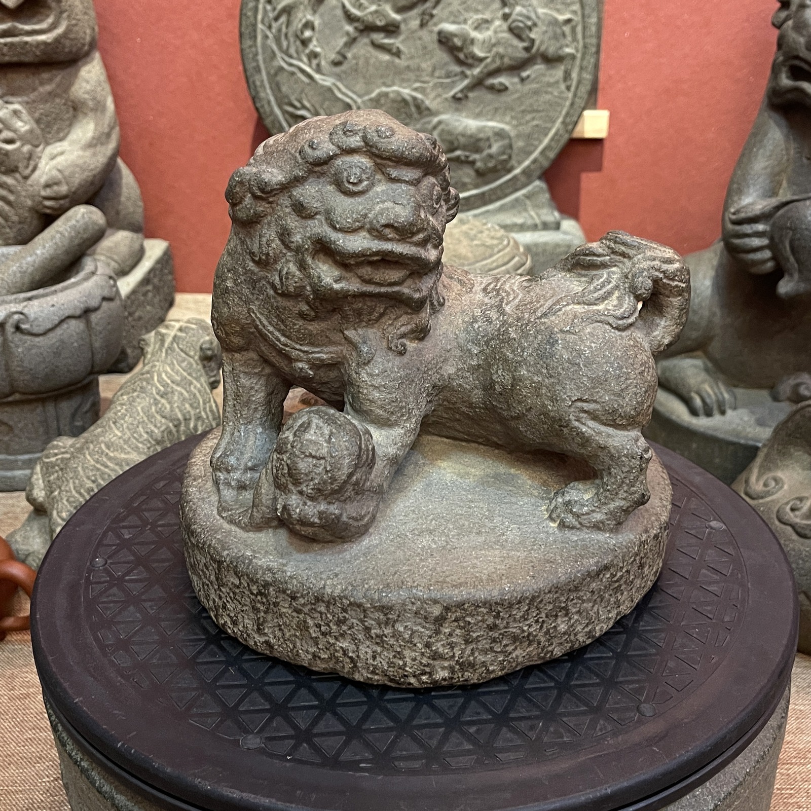 Carved Stone Lion with Brocade Ball