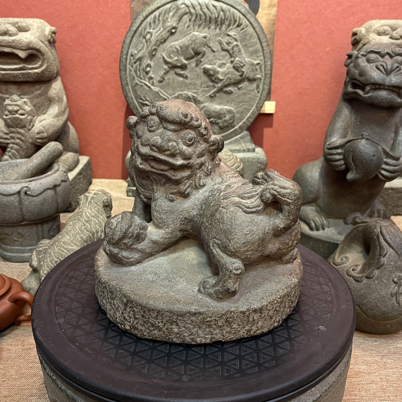 Carved Stone Lion with Brocade Ball
