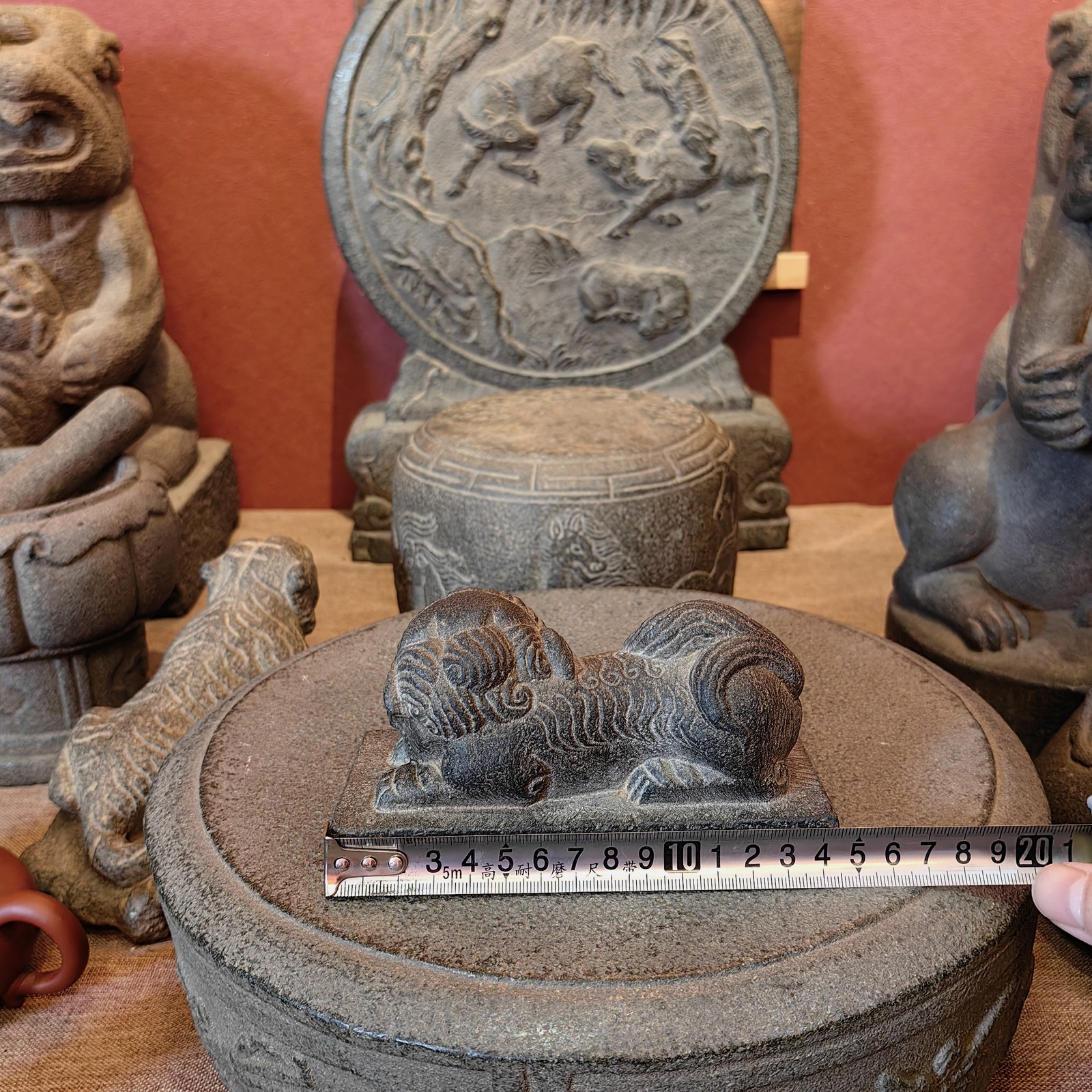 Carved Stone Reclining Lion on Rectangular Base