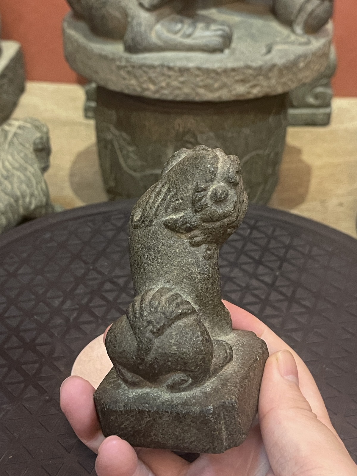 Carved Stone Seated Beast with Curled Tail