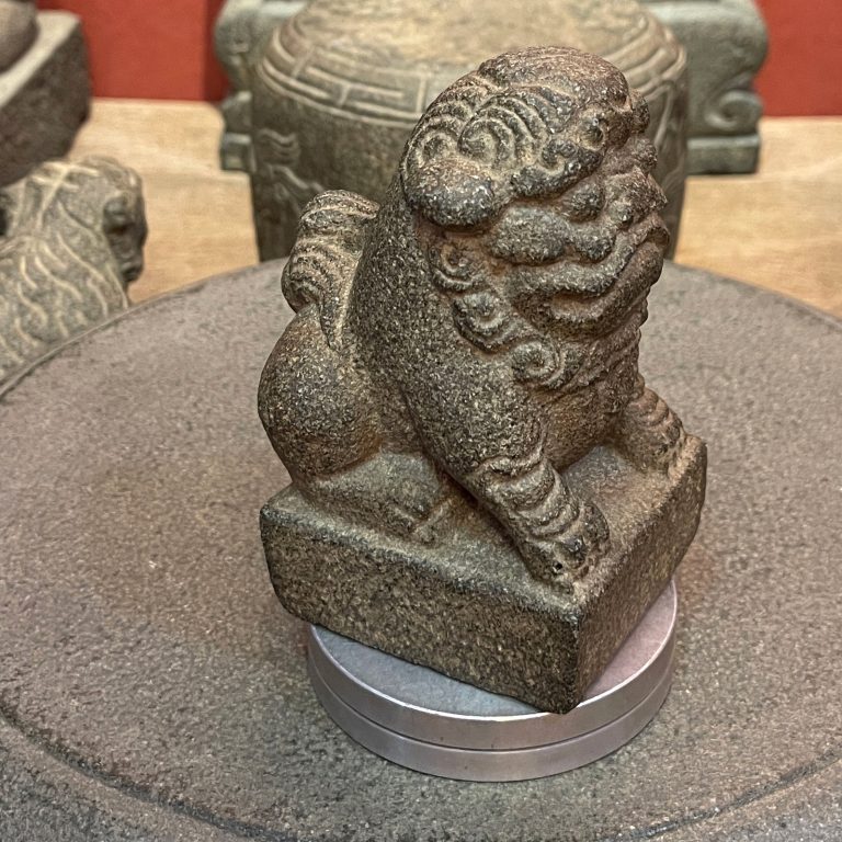 Carved Stone Seated Lion on Square Base