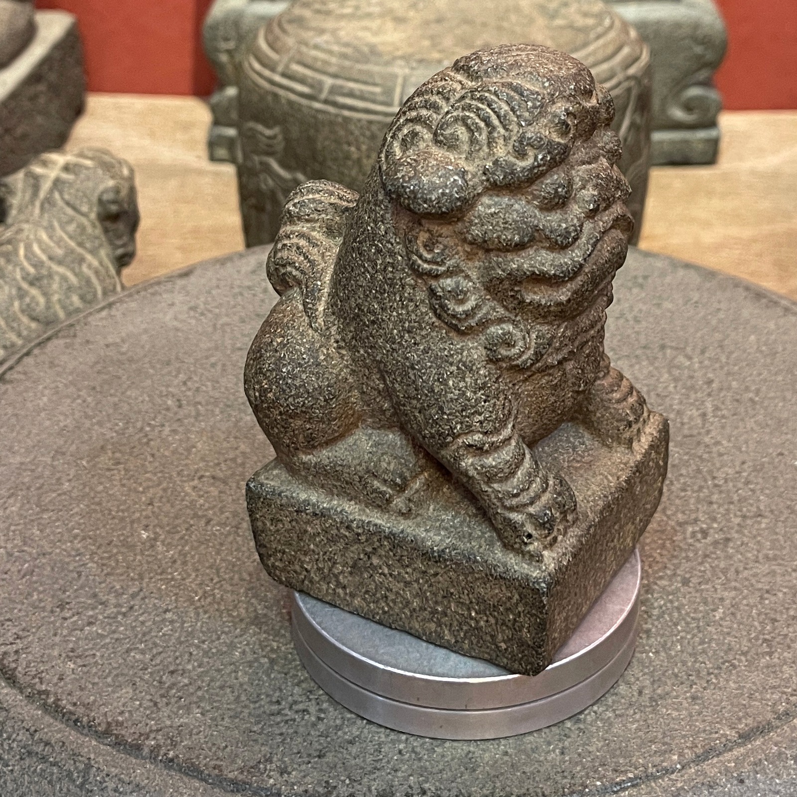 Carved Stone Seated Lion on Square Base