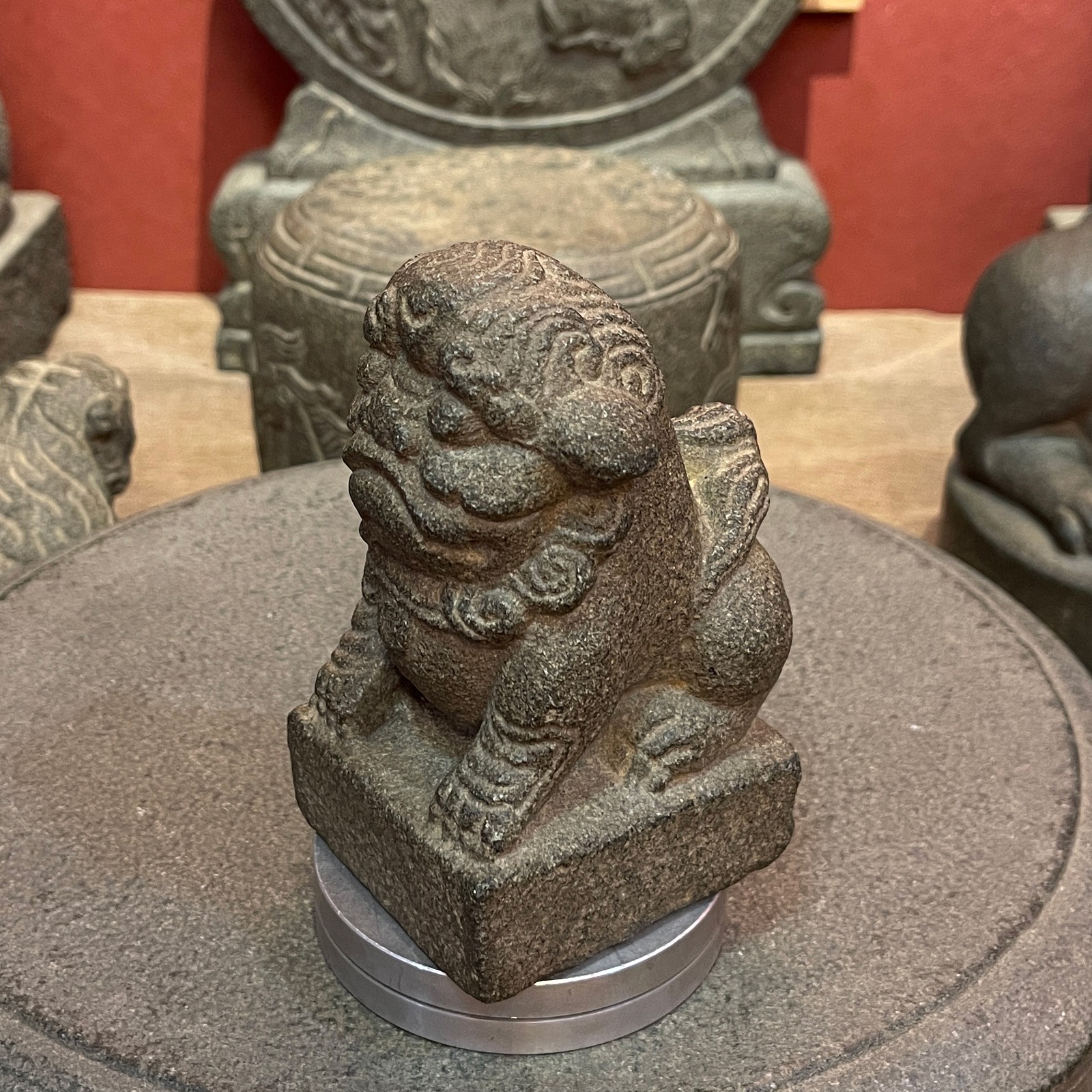 Carved Stone Seated Lion on Square Base