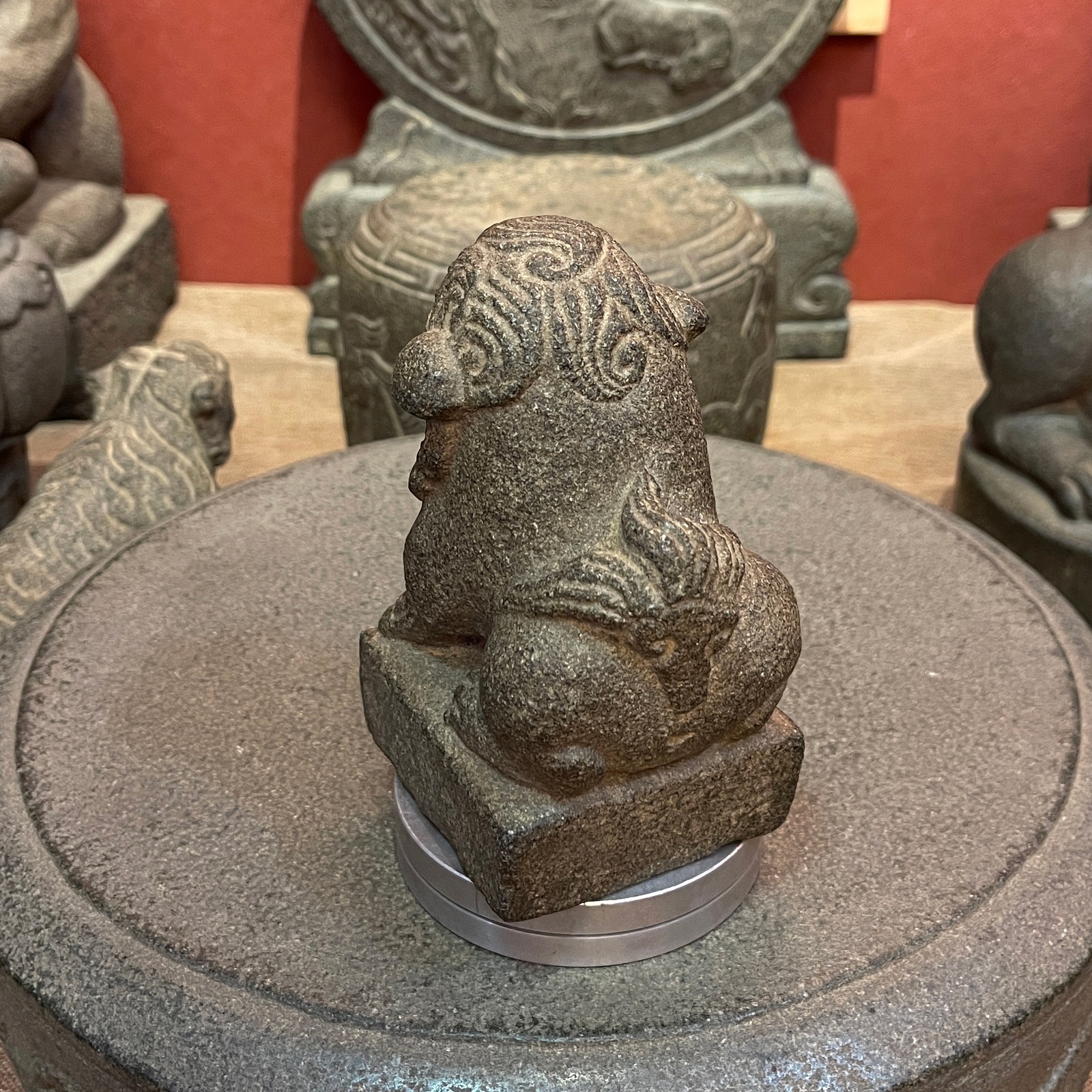 Carved Stone Seated Lion on Square Base