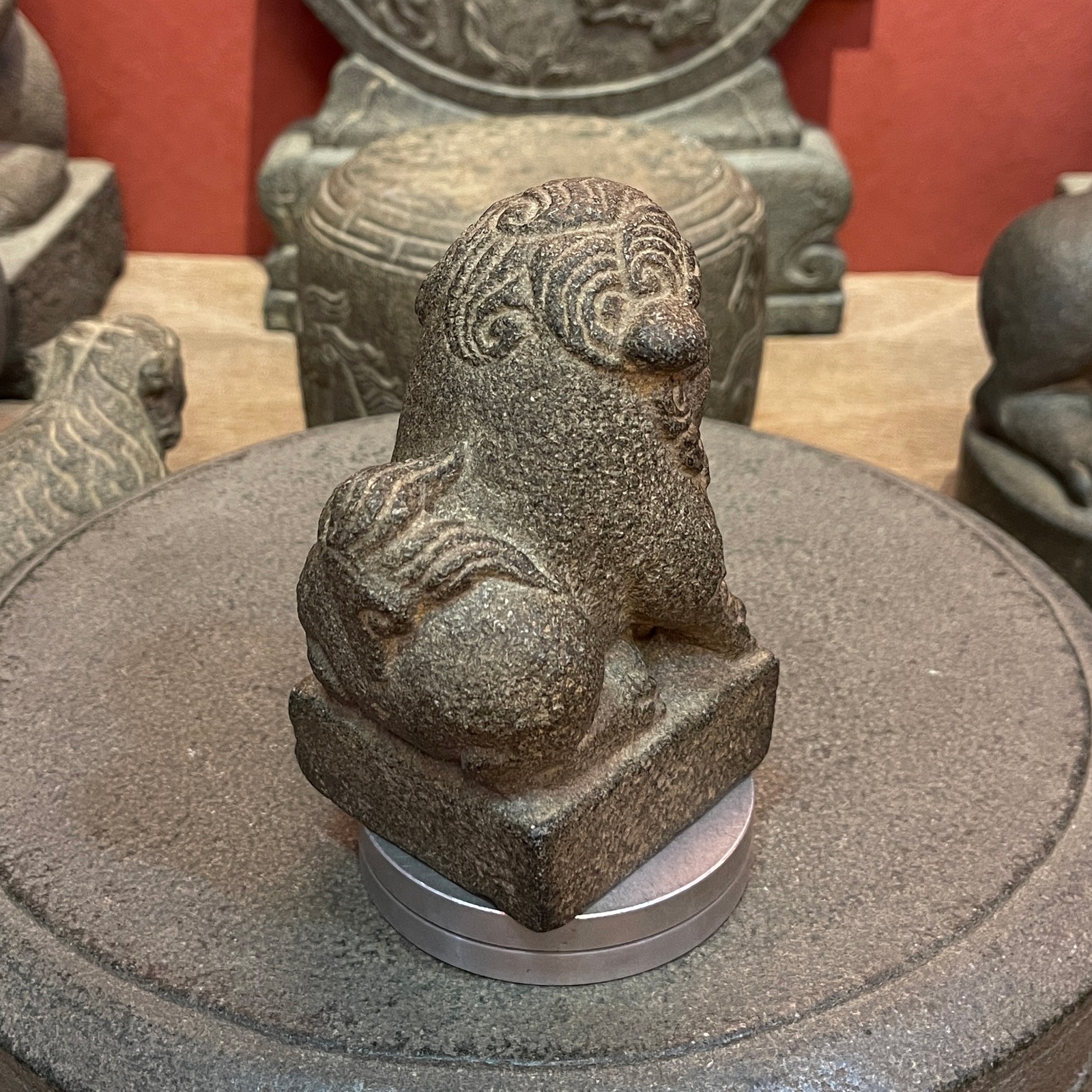 Carved Stone Seated Lion on Square Base